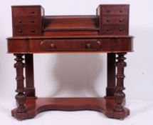 A Victorian mahogany duchess writing table desk.