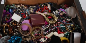 A large quantity of costume jewellery to include necklaces, bracelets,