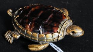 A 19th Century silver plated brass and tortoise shell vesta case modelled as a turtle with hinged