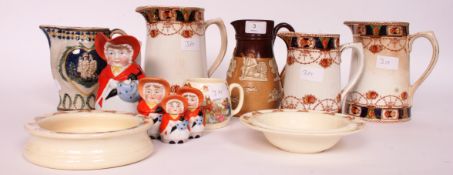 A Royal Doulton Stoneware jug together with a 19th century Faience jug,