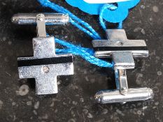 A pair of white metal 925 silver enamel and diamond set cufflinks