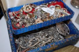 A large selection of costume jewellery to include a jewellery set in a clam shell case Pompador