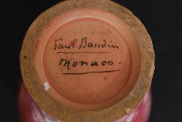 A collection of studio pottery to include drip glaze vase,