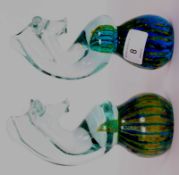 A pair of MDina studio glass paperweights in the form of sea horses,