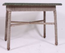 A vintage / retro large rare Lloyd Loom dining / garden table in green with gilt finish