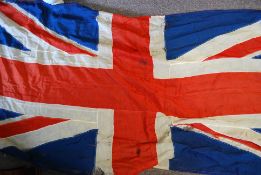A large mid 20th century Union Jack Flag with toggled end being hand and machine stitched.