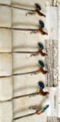 A silver hallmarked and enamel set tooth picks by Adolph Scott,