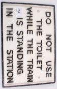 A reproduction cast iron Railway Toilet wall sign.