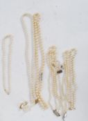 A collection of pearl necklaces to include a good 9ct hallmarked gold cultured pearl necklace,