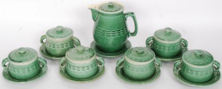 A Bourne Denby ' Epic ' soup service set comprising jug and stand and 6 serving bowls with lids and