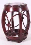 A 20th century Chinese rosewood opium stool H49 W40cm