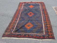 An early 20th century handwoven Persian / Turkish rug having central medallion design with