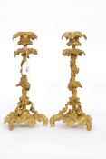An excellent pair of 19th century Victorian candlesticks adorned with grape and vine decoration