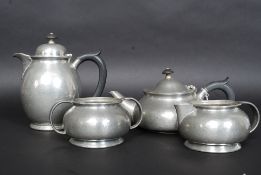 A Liberty ' Tudric ' 4 piece coffee / tea service to include coffee pot, teapot.