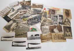 A collection of vintage postcards dating from the early 20th century to include airship, steam,