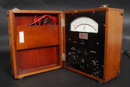 A vintage mahogany cased high quality multimeter instrument, Ranges; Volts, Amps, Watts, Ohms,