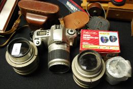 A collection of vintage cameras and lenses to include vintage television camera lenses please see