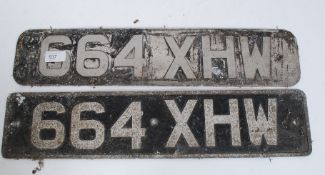 A set of 1960's car registration plates registered to a Morris in 1964 XHW