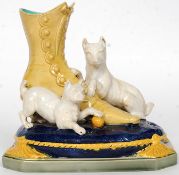 A Victorian 19th Century Brown Westhead Moore & Co majolica terrier and boot spill vase,