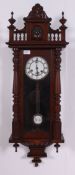 An early 20th century mahogany cased vienna regulator wall clock in the manner of Gustav Becker.