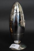 A 20th century retro styled cocktail shaker in the form of a missile