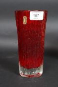 A Whitefriars red glass cylindrical textured vase of conical form in the manner of Geoffrey Baxter