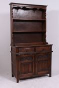 A Jaycee / Old Charm oak dresser in the Jacobean revival style.