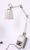 An early 20th century industrial wall mounted adjustable Memlite  anglepoise light,
