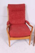 A pair of retro 1970's vintage Cintique armchairs having the original upholstered frames being