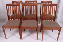 An excellent set of 6 1970's retro teak wood feather railed back Danish style chairs.
