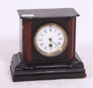 A late 19th / early 20th century marble and slate mantel clock with rouge marble supports,