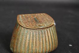 A Victorian brass vesta in the form of a krill basket having hinged top ( see illustration )