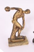 A spelter figurine of a spaniel over base together with a cast metal figurine of a discus thrower