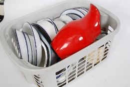 A collection of retro vintage enamel plates in white with blue banding - vintage camping lot