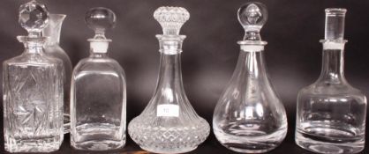 A collection of glass decanters dating from the 20th century all with stoppers ( see illustration )