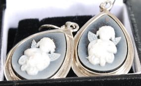 A pair of 925 white metal silver cameo set earrings