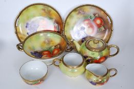An excellent 20th century handpainted still life fruit bowl series part tea service comprising