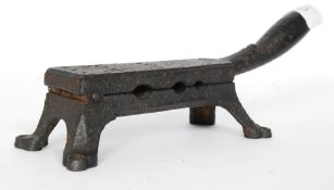 A Nineteenth century cast iron Chemists cork press