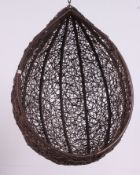 A retro 20th century garden hanging swivel chair.