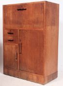 A fabulous 1930's Heals style oak students bureau.