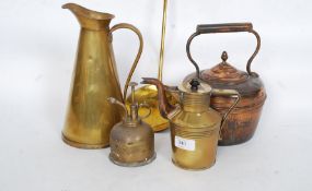 A collection of brass wares to include a good 19th century lidded jug together with a brass kettle