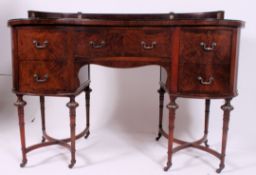 A Victorian mahogany kidney shaped writing table desk.