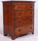 A 20th century Georgian style burr walnut bow fronted chest of drawers.
