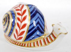 An early Royal Crown Derby paperweight in the shape of a Garden Snail,