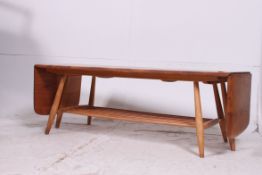 A very rare Ercol double extending drop end coffee table, solid Elm top,