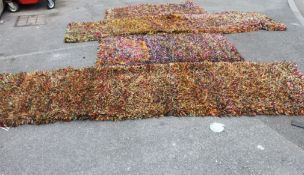 A collection of 4x retro multicoloured 1970's shagpile carpets to include two runners and two mats
