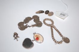 A  collection of vintage jewellery to include silver coin bracelets x2, gentlemans cuffs,