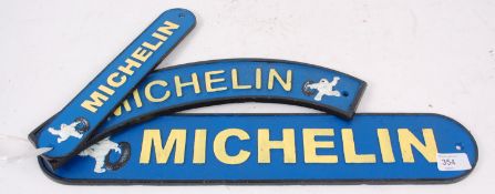 Three reproduction Michelin Tyres advertising garage painted metal signs