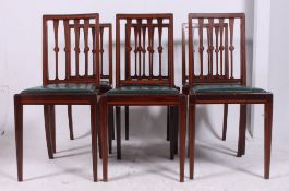 A set of 6 Edwardian mahogany inlaid dining chairs by Waring & Gillows of London.