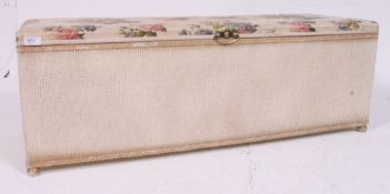 A vintage 1950's good quality chintz upholstered Lloyd Loom style ottoman blanket box with